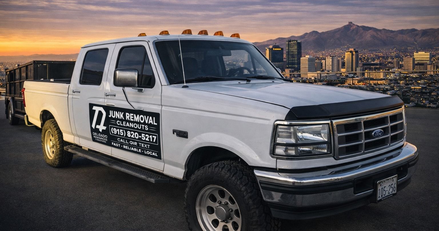 Delgado Resources & Solutions truck and dump trailer above the El Paso skyline at dusk